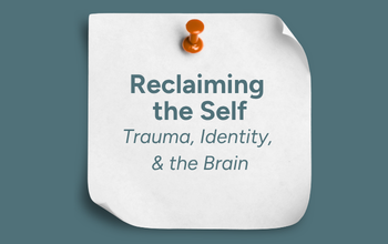 Sticky note pinned to a wall that reads: Reclaiming the Self: Trauma, Identity, & the Brain.